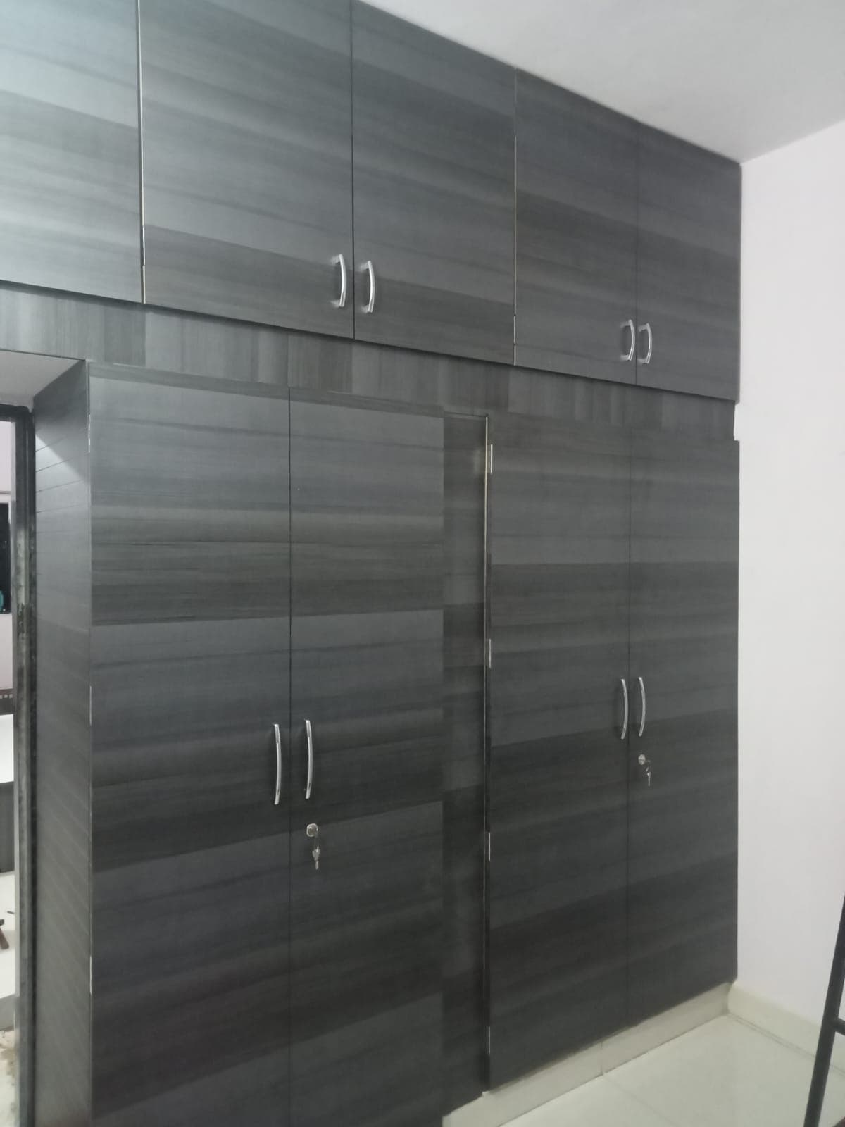 Custom built-in wardrobe closet with storage solutions